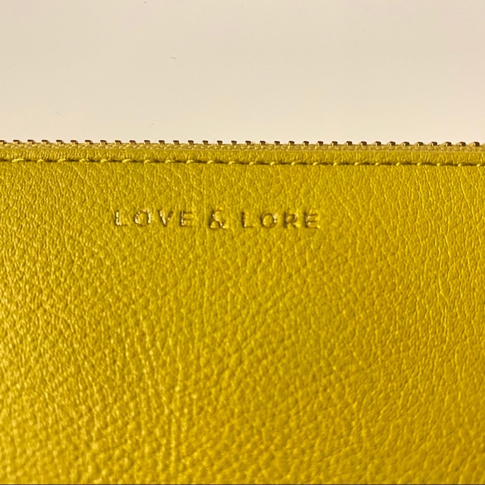 NWT LOVE & LORE curved pouchette citron colour